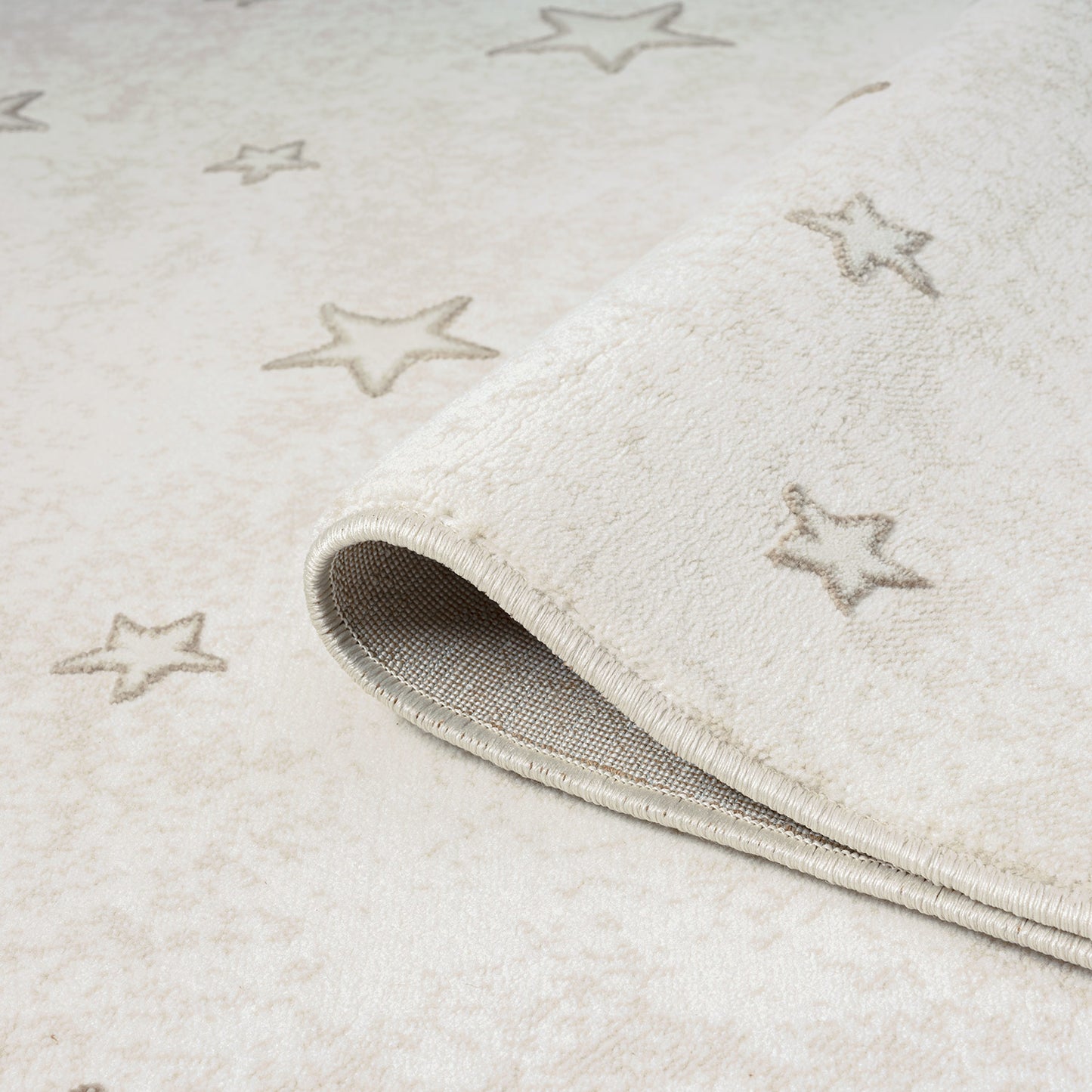 Luna 725 creme / Kinderteppich mit Sternen Muster